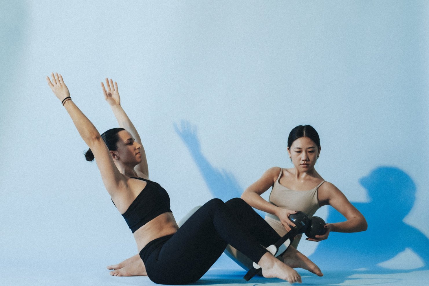 Sesión de pilates en GlowPilates — franquicia de pilates boutique en España